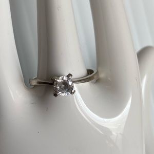 925 sterling silver cubic zirconia solitaire women promise ring. Size 7. Used.